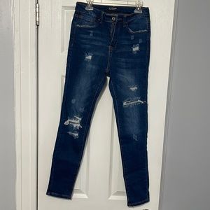 High waisted destroyed skinny jeans